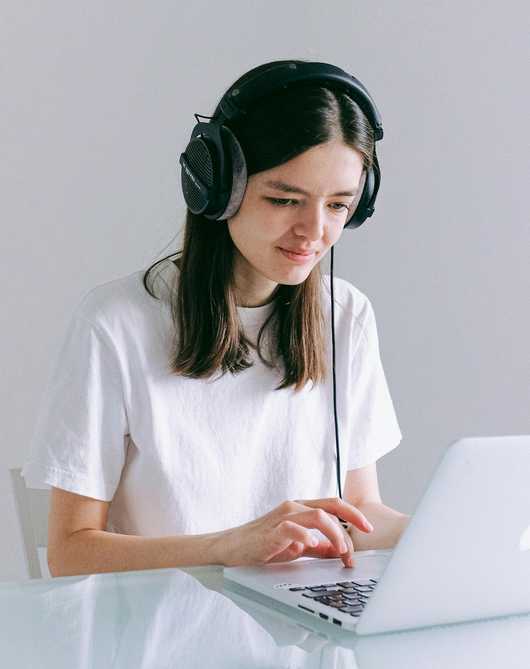 Photo of a woman working on her laptop