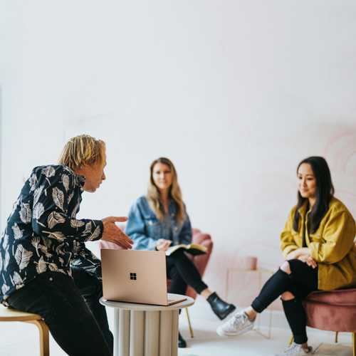 Photo of a team of employees discussing